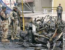 Baghdad: 2 killed by roadside bomb, 6 killed by gunmen