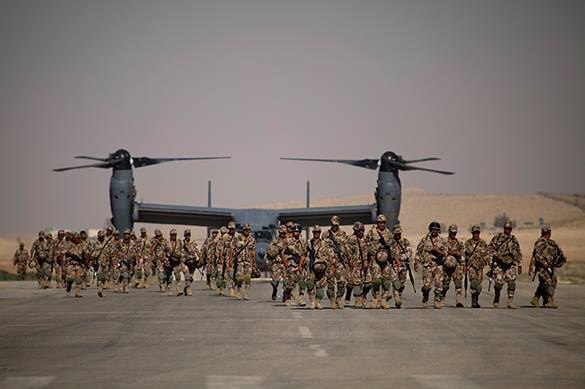 War against ISIL turns into strange spectacle. More US troops in Iraq