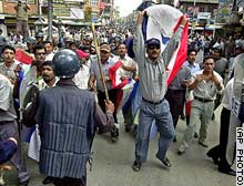 Communist rebels and supporters protest in Nepalese capital