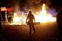 Danish police arrest up to 200 after street riots in Copenhagen