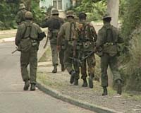 Troops disarm police in Fiji, escalating coup fears