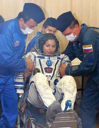 Space tourist Anousheh Ansari and crew return to Earth