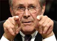 Rumsfeld hears concerns about Chavez weapons buildup