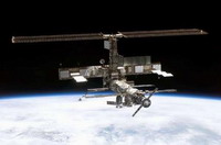 NASA safely delivers astronaut and two Russian cosmonauts to space station