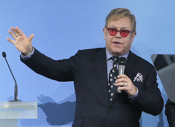 Putin wants to meet Elton John to discuss 'any questions'. Elton John
