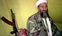 Osama bin Laden appears in new message holding a Kalashnikov