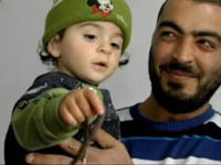 Israeli infant bites off snake's head. 46472.jpeg