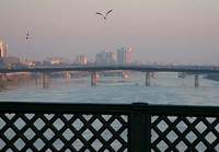 Bomb kills 10 on major bridge in central Baghdad