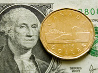 Canadian dollar tops US brother for the first time in three decades
