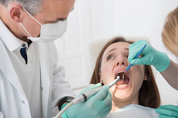 Dentist removes patient's 22 healthy teeth. 60585.jpeg
