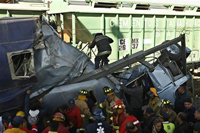 Freight train slams into passenger bus in Mexico, killing 22