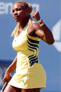 Venus and Serena Williams win first- round matches at the US Open
