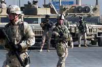 Iraq: U.S. soldiers detain 18 suspected militants in Baghdad area raids