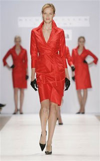 Some NWA flight attendants want to wear red dress uniform