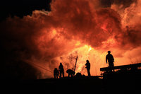 Massive fire at military warehouse kills ten. 52682.jpeg
