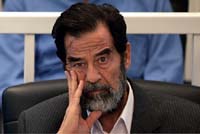 Saddam, six others charged with genocide for crackdown against the Kurds