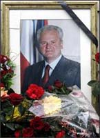 Milosevic is buried in his hometown after farewells draw tens of thousands