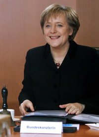 Germany's Merkel pledges revision of key jobless profit reform