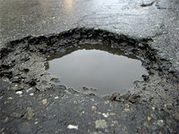 Russian drivers name potholes after their mothers-in-law. 49926.jpeg