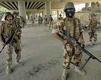 Four Iraqi soldiers accused of raping Sunni woman and her two daughters