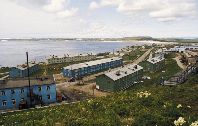 Which spot on Earth gets least sunlight?