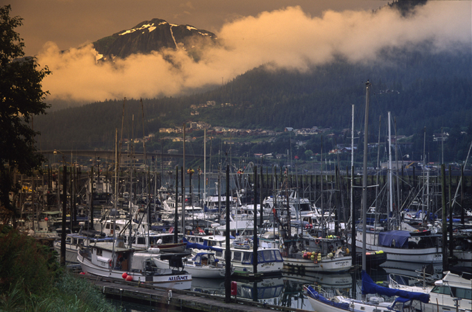 Which spot on Earth gets least sunlight?