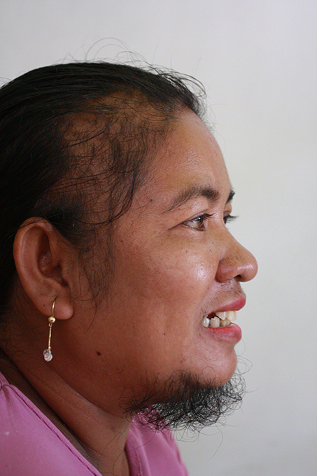 Indonesian woman hides her beard for 13 years