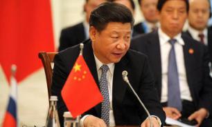 China's Xi Jinping officially opens new era. Of what?