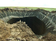 Giant sinkhole in Siberia turning into lake