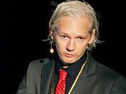Julian Assange smiles to London's little roars