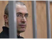 Yukos scandal continues with new raids and new charges to be brought against Mikhail Khodorkovsky