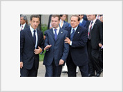 Medvedev, Sarkozy and Berlusconi defamed on photos taken during G8 summit