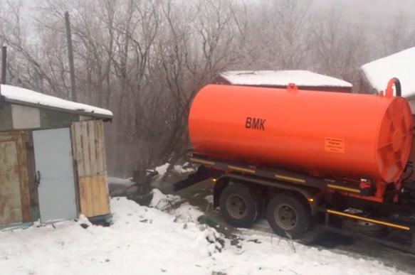 In Russia's Far North, sewage cleaners dump steaming faeces straight into the bushes