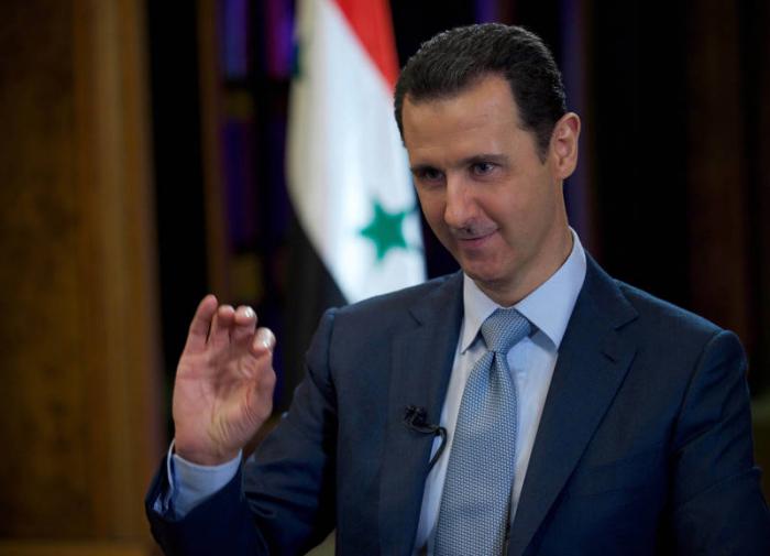 Bashar Assad: Syria recognises new Russian borders