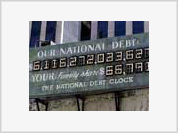 The USA's National Debt Clock can't keep up with Bush's spending