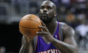 World’s Tallest Model Ekaterina Lisina Meets NBA Legend Shaquille O’Neal