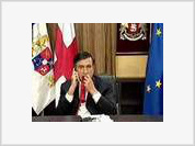 Georgian President Saakashvili eats his tie on TV live (video)