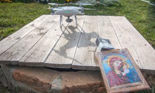 Ukrainians mount icon on drone to bless their village from above
