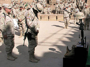Bush disregards significant loss of 2,000th US serviceman in Iraq