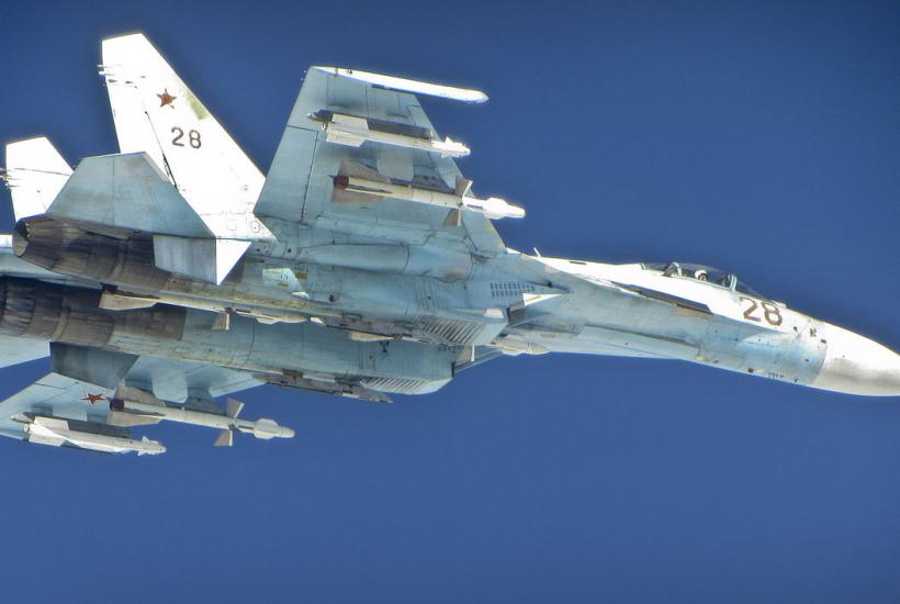 A Russian SU-27 Flanker aircraft photographed from a RAF Typhoon