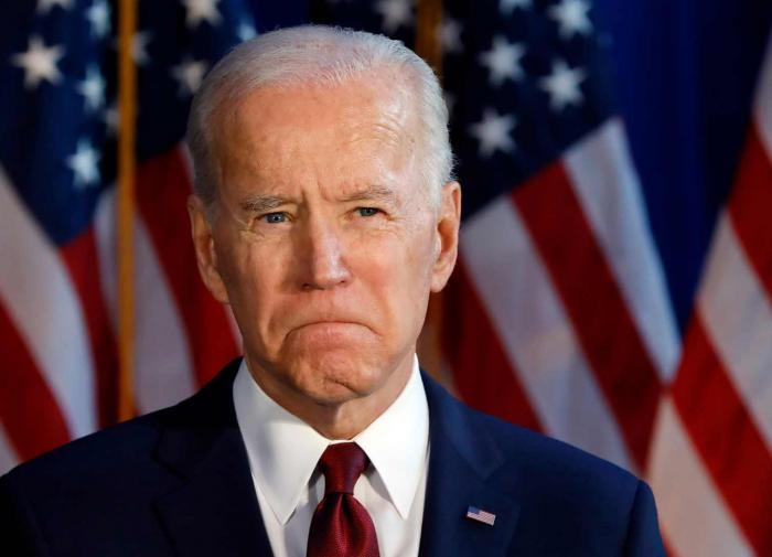 Joe Biden, while chewing gum on the go, misses new world order out