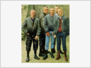 Young men become skinheads following their friends' example