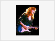 Bonnie Raitt joins the ranks of entertainers who are critical of George Bush