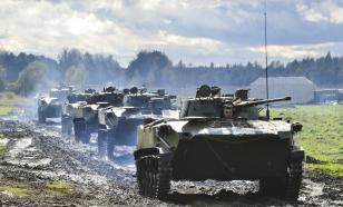 Column of Russian military vehicles, Grad MLRS, artillery and tanks travel to Sudzha