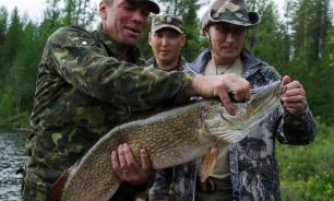 Putin chases pikes in ice-cold Siberian lakes