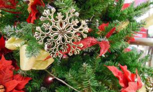 Latvia decorates Christmas trees with stylized swastikas