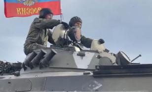 Russian Armed Forces units move through populated areas in Kharkov Region