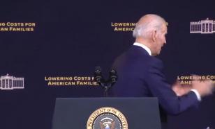 Joe Biden shakes hands with the air again
