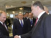 Putin and Poroshenko shake hands in Minsk