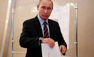 Putin wins election in landslide victory with rivals gaining just 15% and lower